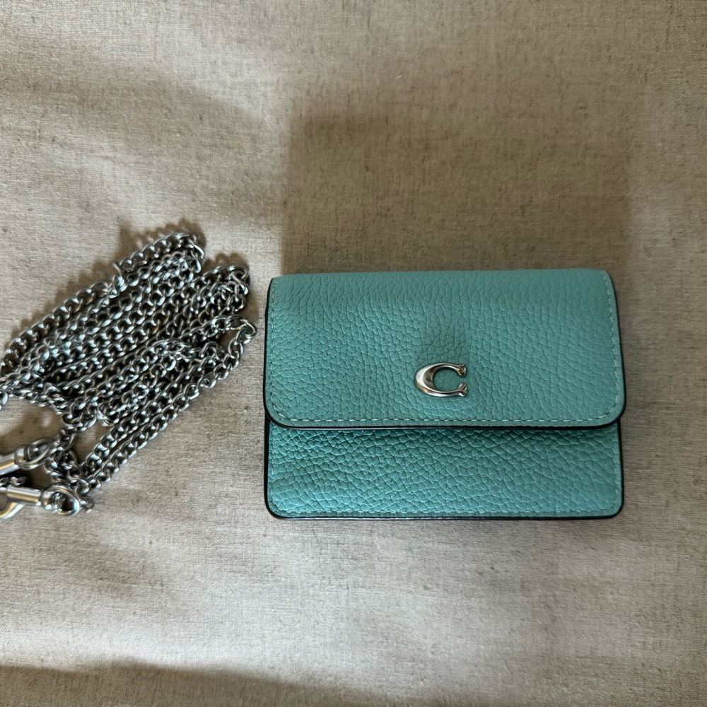 Brand new, Coach flap card case with chain in Faded Blue (Tiffany blue)